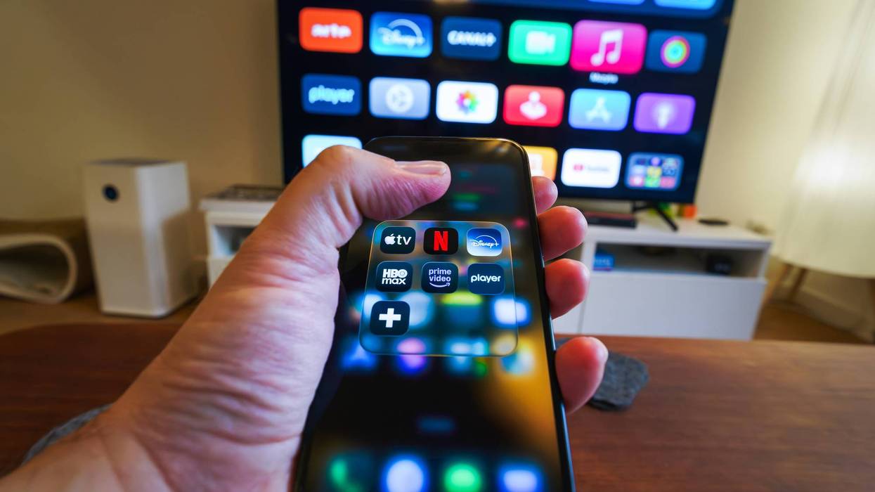 Streaming platforms icon home entertainment smartphone television remote control living room