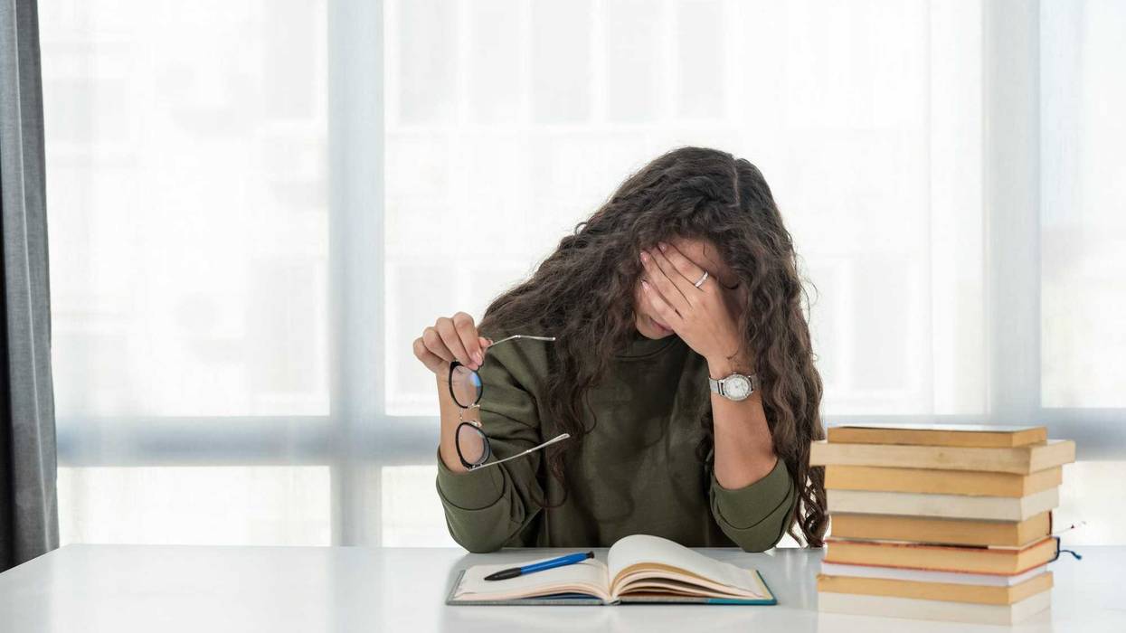 Stressed college student stock photo.