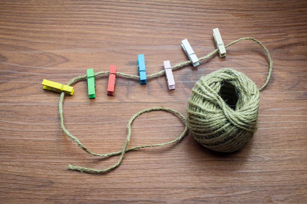 String and clothes pins for DIY clothesline