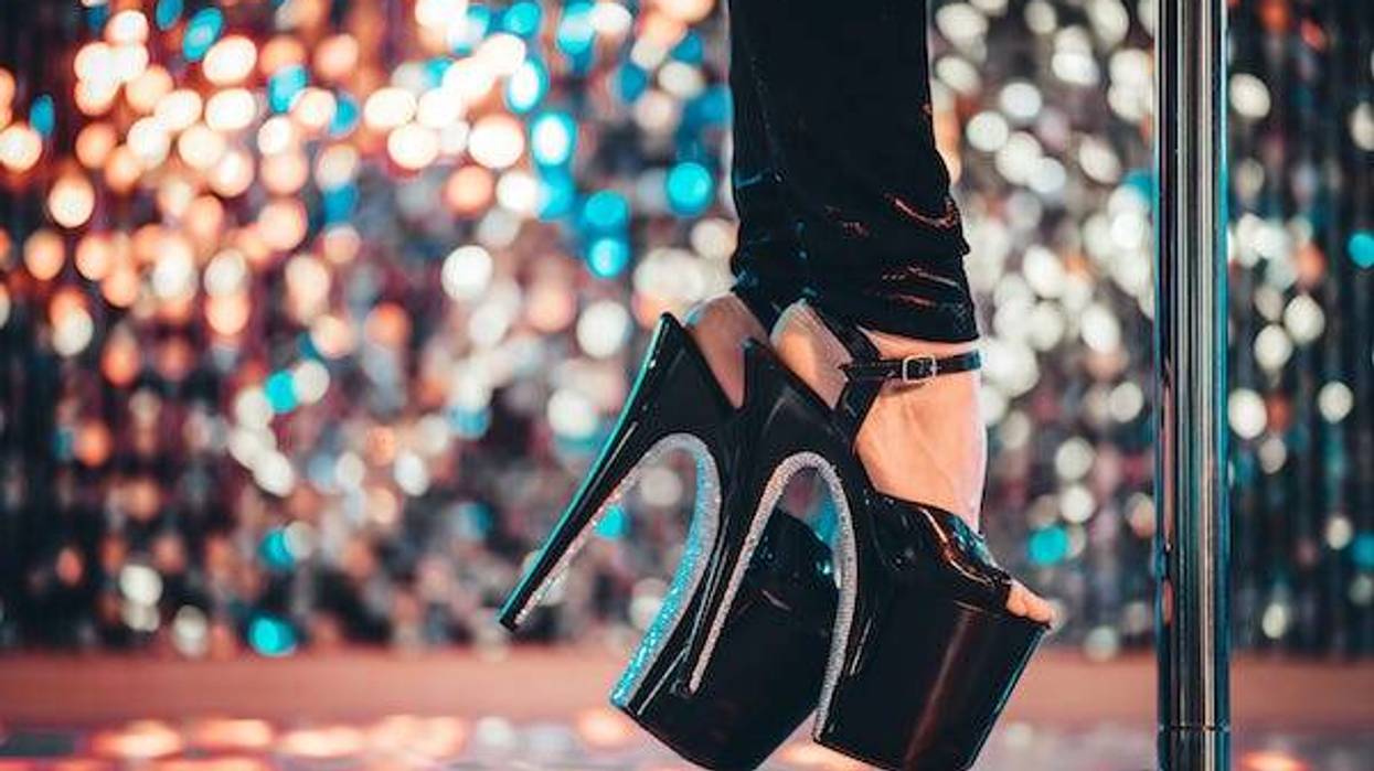 Stripper's shoes dancing near pole