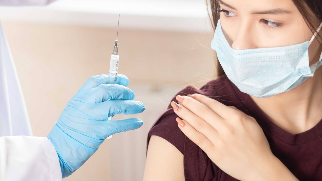 Student getting a vaccine.