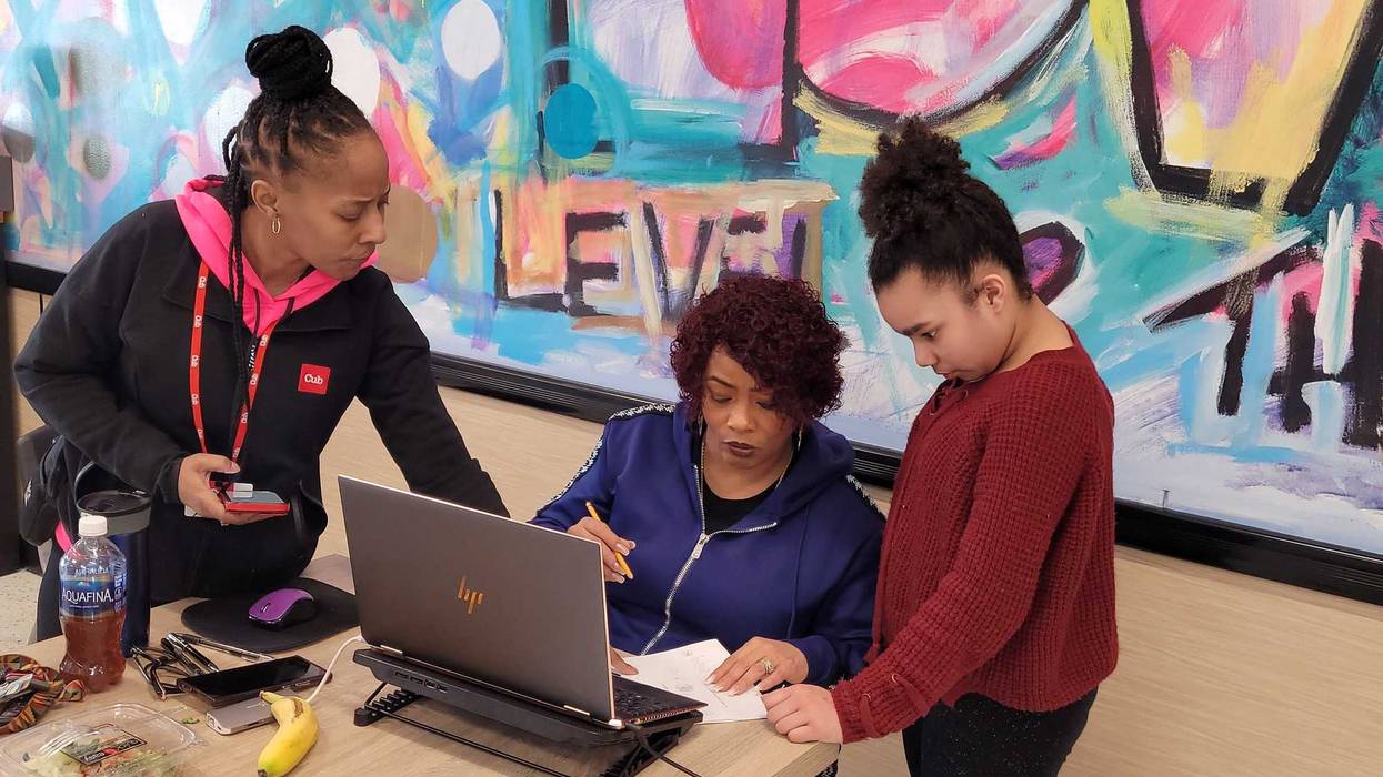 Student, Jacari Riggins receives math help from tutors at Northside Community Center