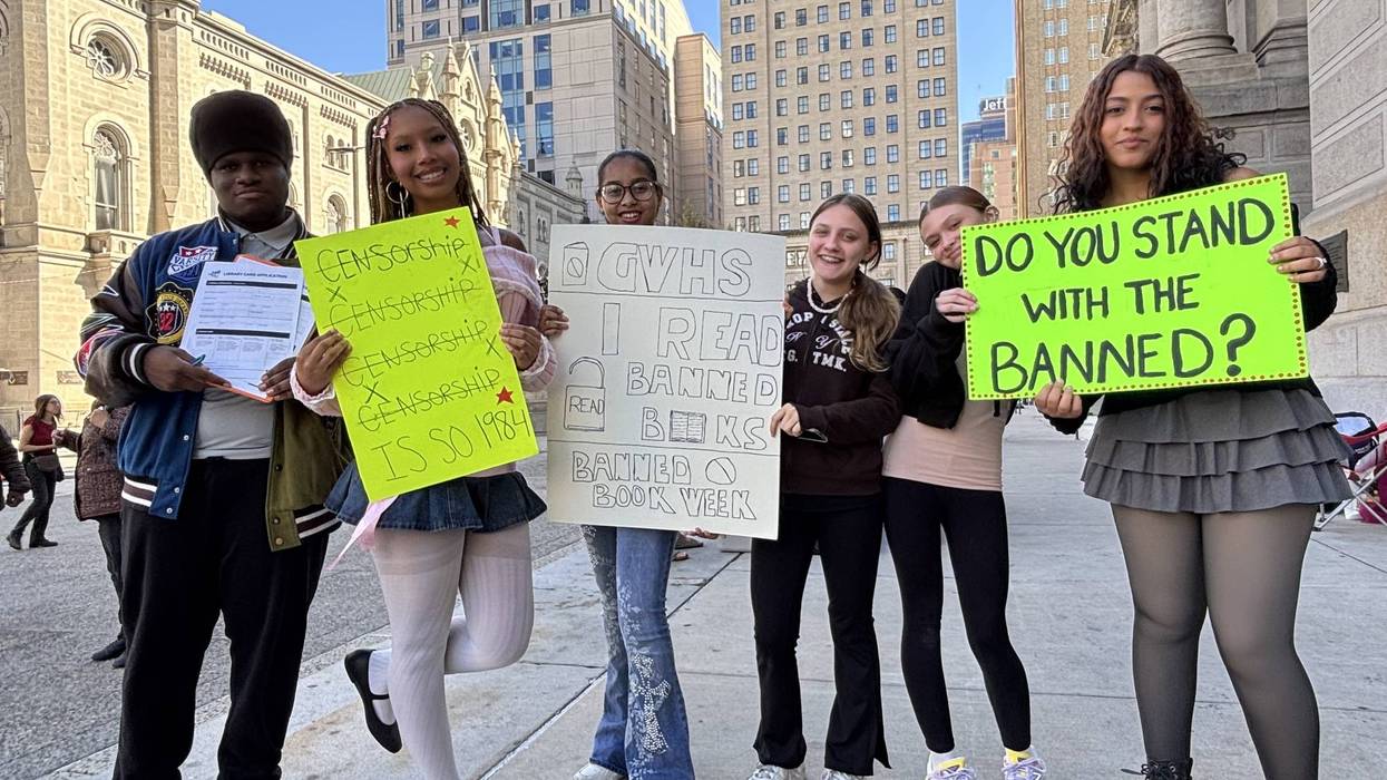 Students at George Washington High School hold signs at Philadelphia City Hall as they gave away banned books to mark 'Banned Book Week.'