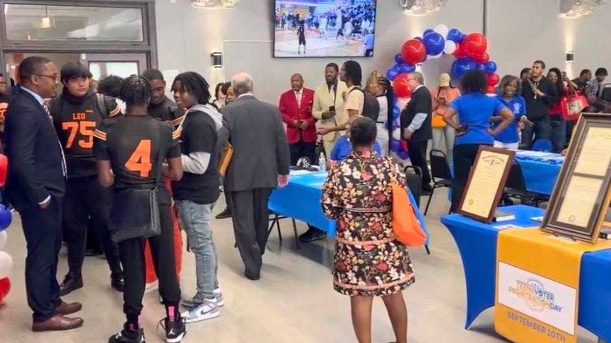 Students from Leo Catholic High School in Chicago's Auburn-Gresham neighborhood participate in a voter registration drive on Sept. 10, 2024.