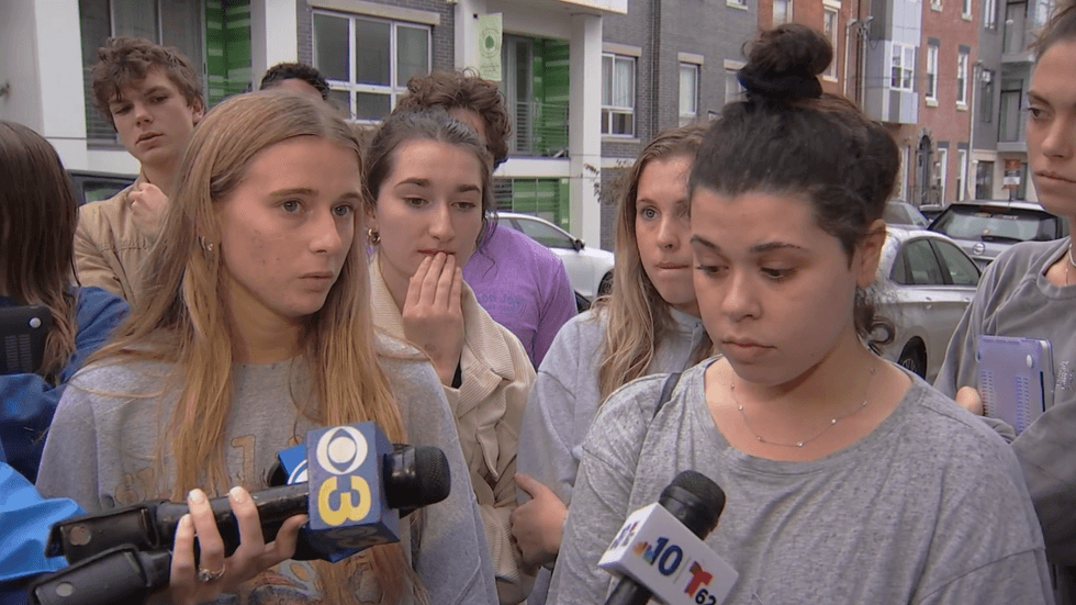 Students interviewed after a home invasion at Temple University.