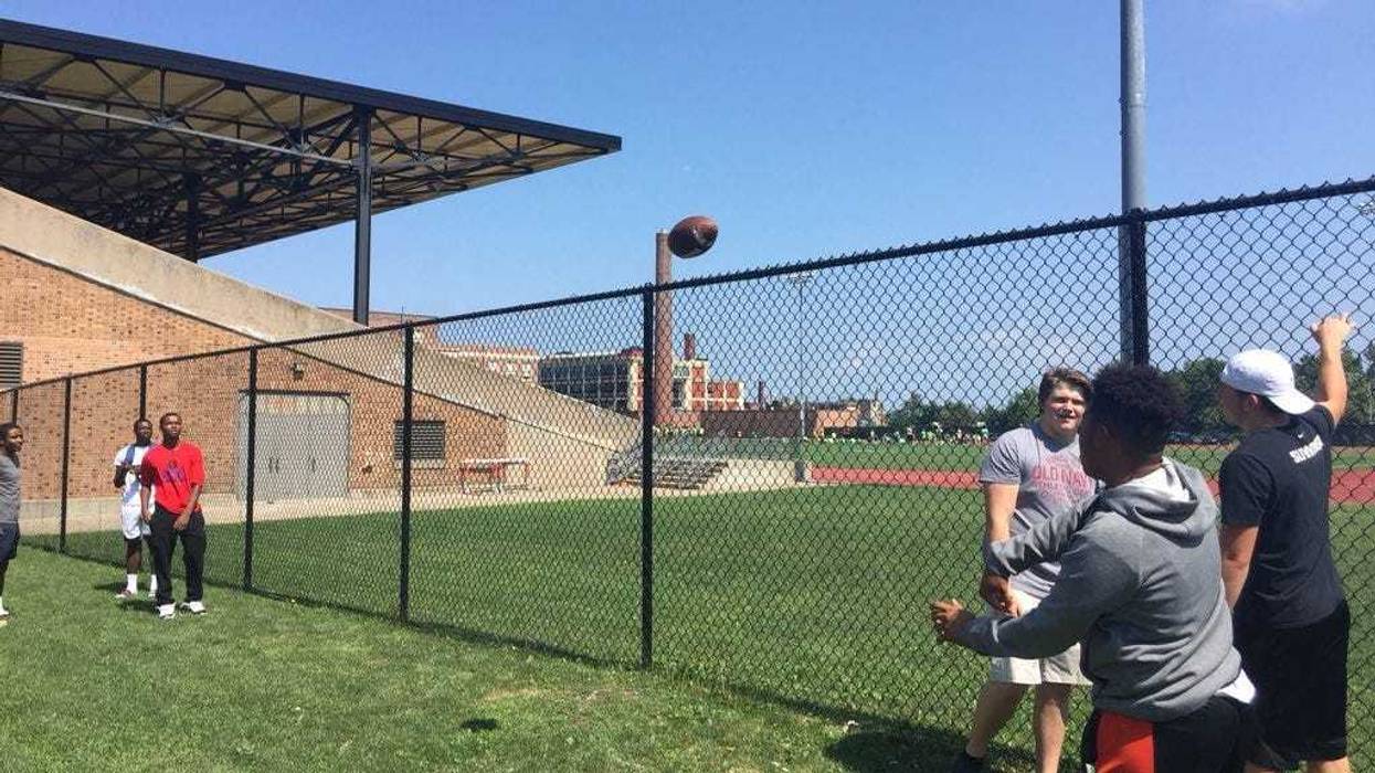 Students play football outside Bennett High School. August 9, 2018 (WBEN Photo/Mike Baggerman)