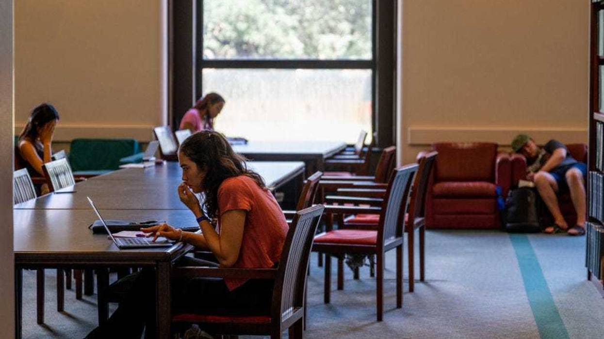 Students study in the Rice University Library on August 29, 2022 in Houston, Texas. U.S. President Joe Biden has announced a three-part plan that will forgive hundreds of billions of dollars in federal student loan debt. Since announced, the plan has sparked controversy as critics have begun questioning its fairness, and addressing concerns over its impact on inflation. (Photo by Brandon Bell/Getty Images)