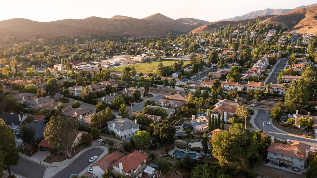 suburban houses surrounded by hills