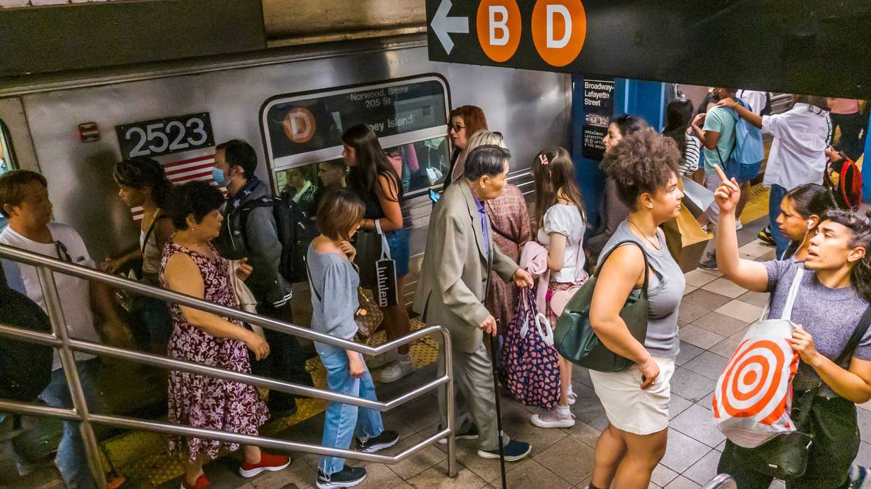 Subway riders crowd the Broadway–Lafayette Street station in SoHo in May