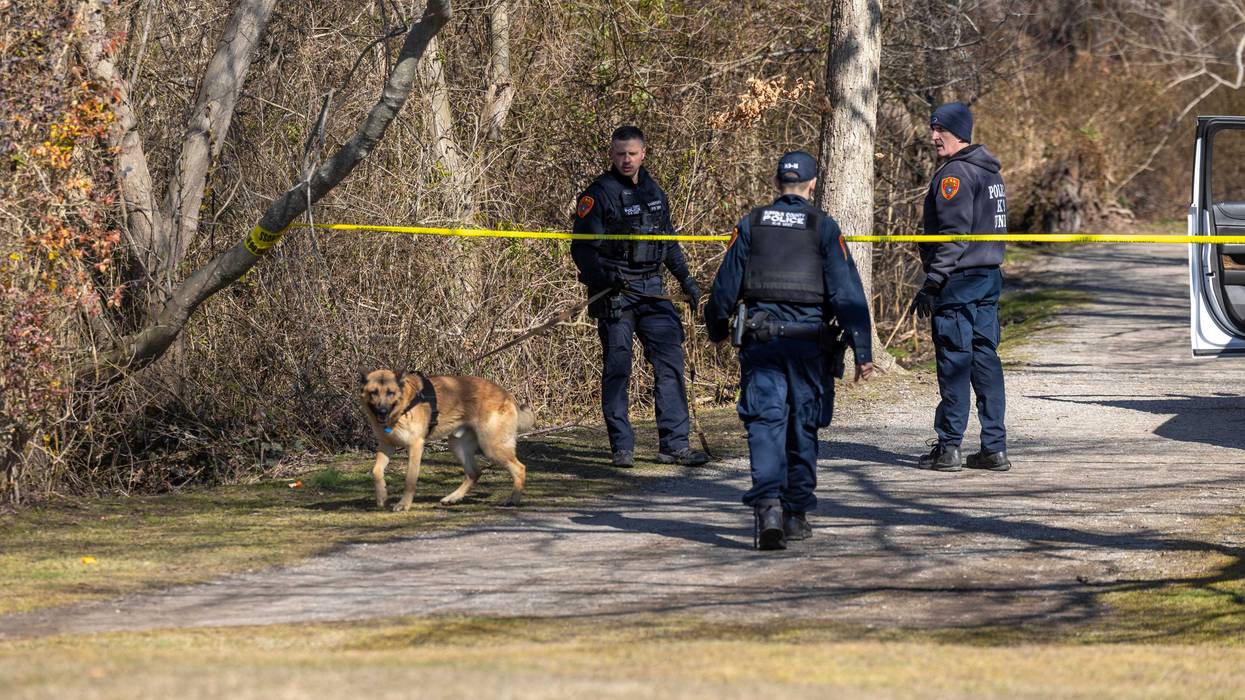 Suffolk County Police canine units search Southards Pond Park on March 1, 2024, in Babylon