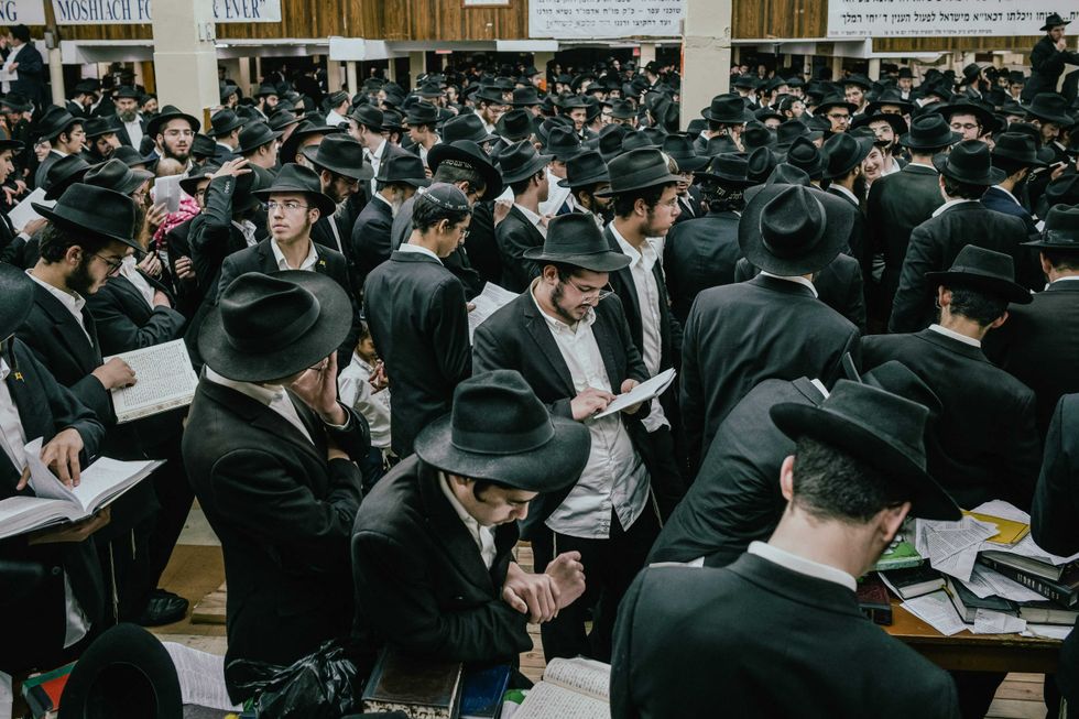 Sukkot is a week-long Jewish holiday that celebrates the fall harvest. The Chabad-Lubavitch World Headquarters is located on Eastern Parkway in the Crown Heights section of Brooklyn. People celebrate on Oct. 5, 2023.