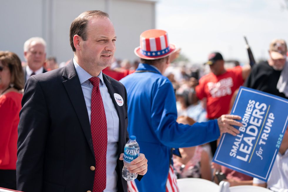SUMMERVILLE, SOUTH CAROLINA - SEPTEMBER 25: South Carolina Attorney General Alan Wilson takes his seat during a rally with former President Donald Trump on September 25, 2023 in Summerville, South Carolina.