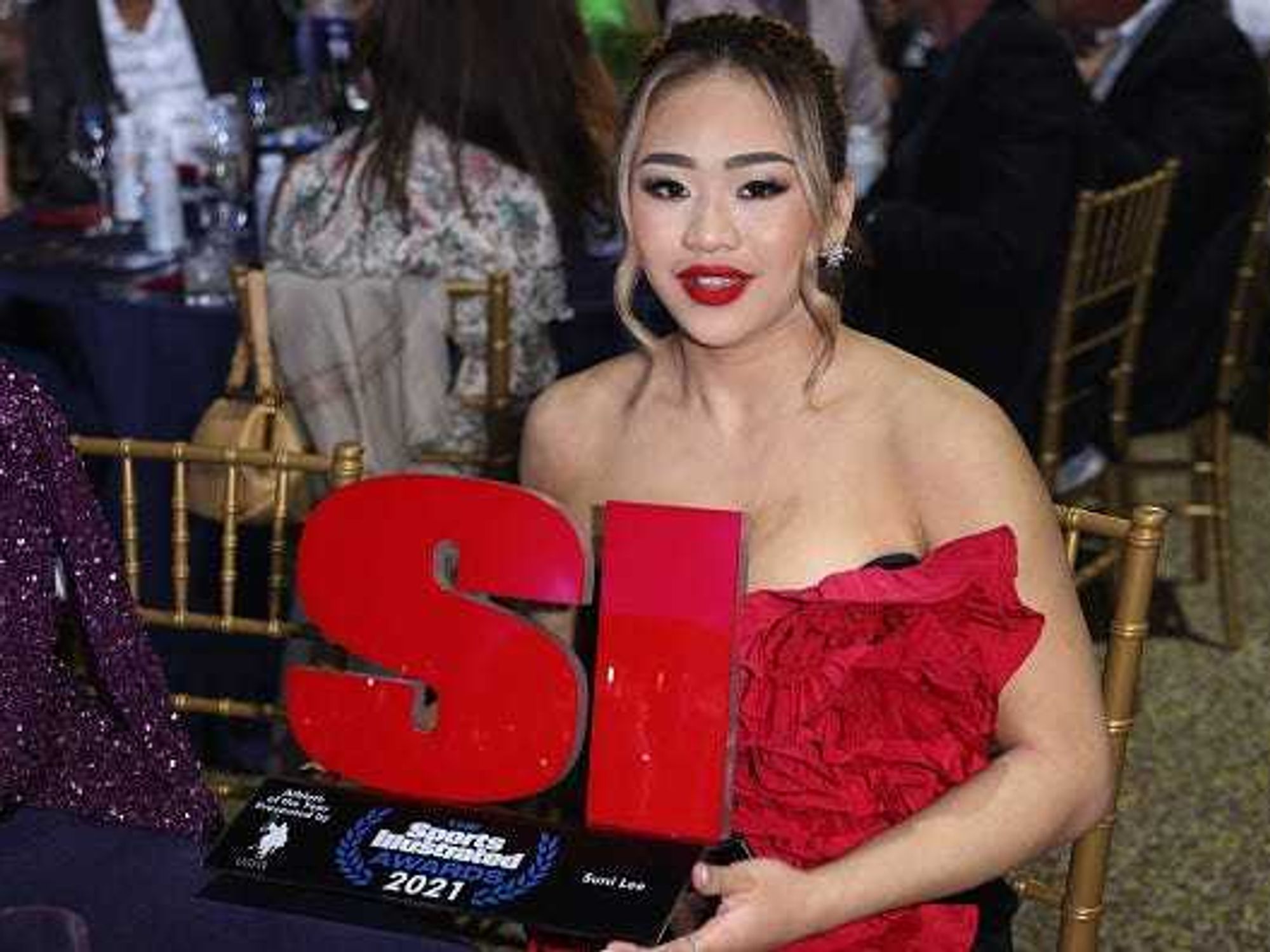 suni lee red dress Sunisa Lee flirts with flawless legs in little red dress, high heels