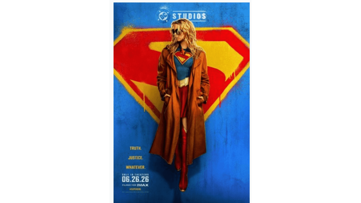 Supergirl movie poster: Woman in trench coat, sunglasses, over graffiti S-shield. Release 06.26.26.