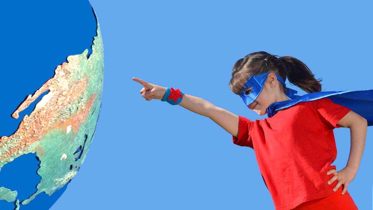 superhero girl pointing at earth