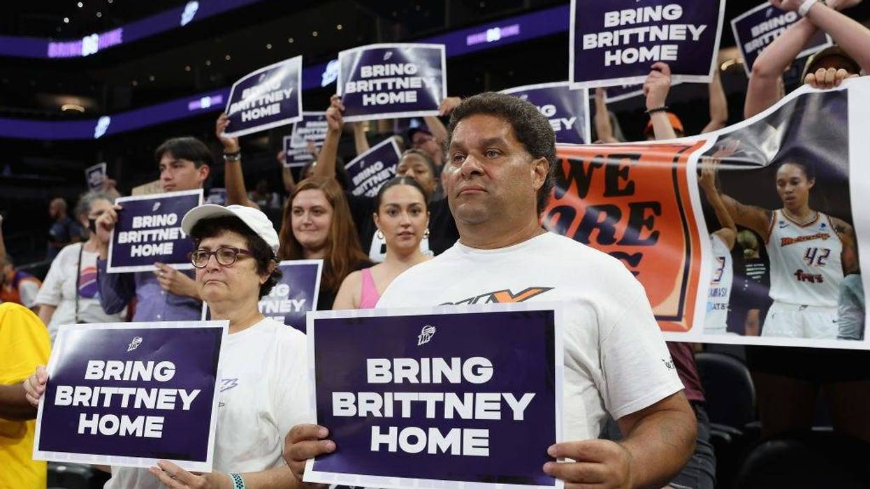 Supporters hold up signs reading "Bring Brittney Home" during a rally to support the release of detained American professional athlete Britney Griner at Footprint Center on July 06, 2022 in Phoenix, Arizona.