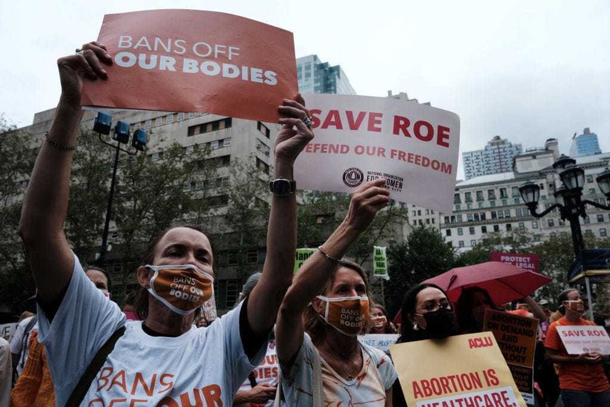 Supporters of abortion rights participate in a rally to denounce recent restrictions on abortion in the state of Texas on September 09, 2021 in the Brooklyn borough of New York City.