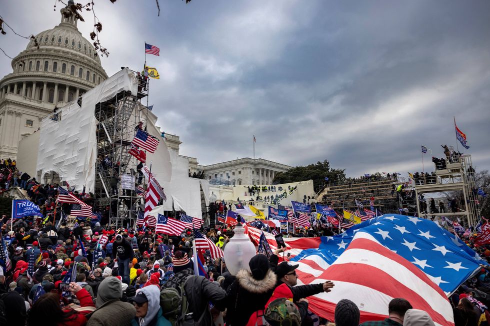 Supporters of Donald Trump clash with police and security forces as people try to storm the U.S. Capitol on Jan. 6, 2021, in Washington, D.C.