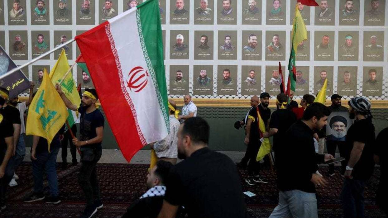 Supporters of Hezbollah gather at al-Ashoura square in southern suburbs of Beirut to listen to the speech of the Secretary-general of Hezbollah Hassan Nasrallah on November 3, 2023 in Beirut, Lebanon. The Secretary General of Hezbollah, Hassan Nasrallah, will speak today for the first time since Israeli's attack on Gaza after the Oct 7 Hamas attacks. (Photo by Marwan Tahtah/Getty Images)