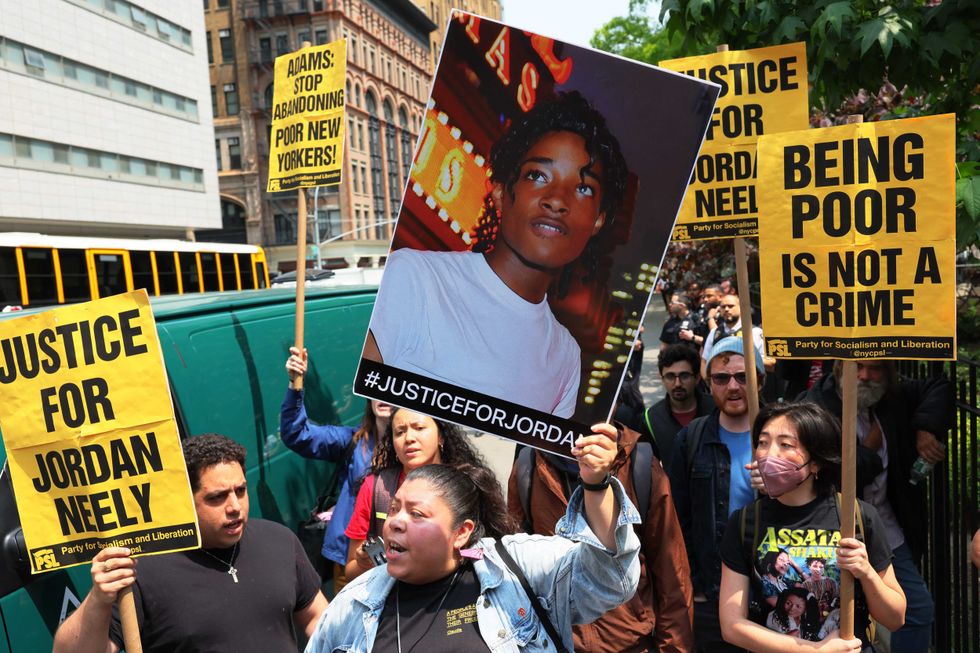 Supporters of Jordan Neely protest a rally in support of Daniel Penny at Collect Pond Park on May 24, 2023 in New York City.