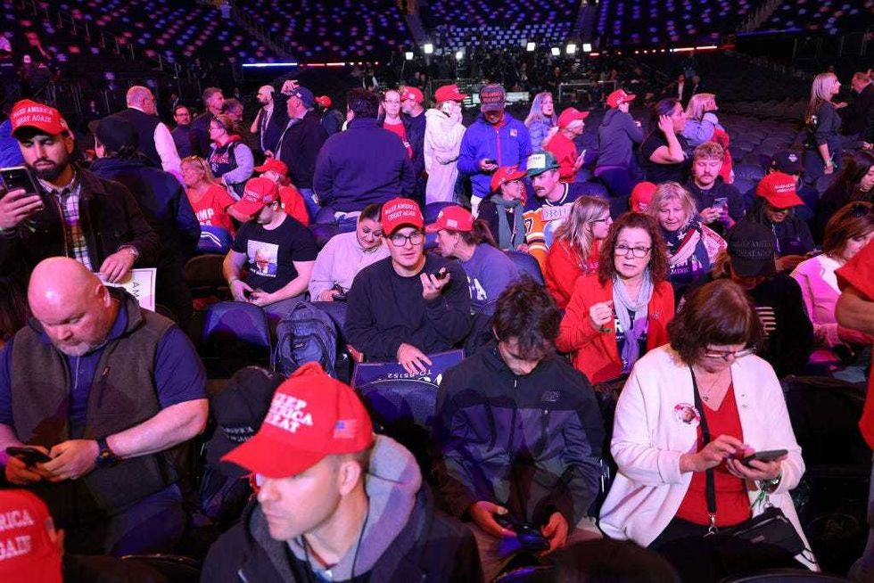Supporters of Republican presidential nominee, former U.S. President Donald Trump arrive for a campaign rally at Madison Square Garden on Oct. 7, 2024 in New York City.