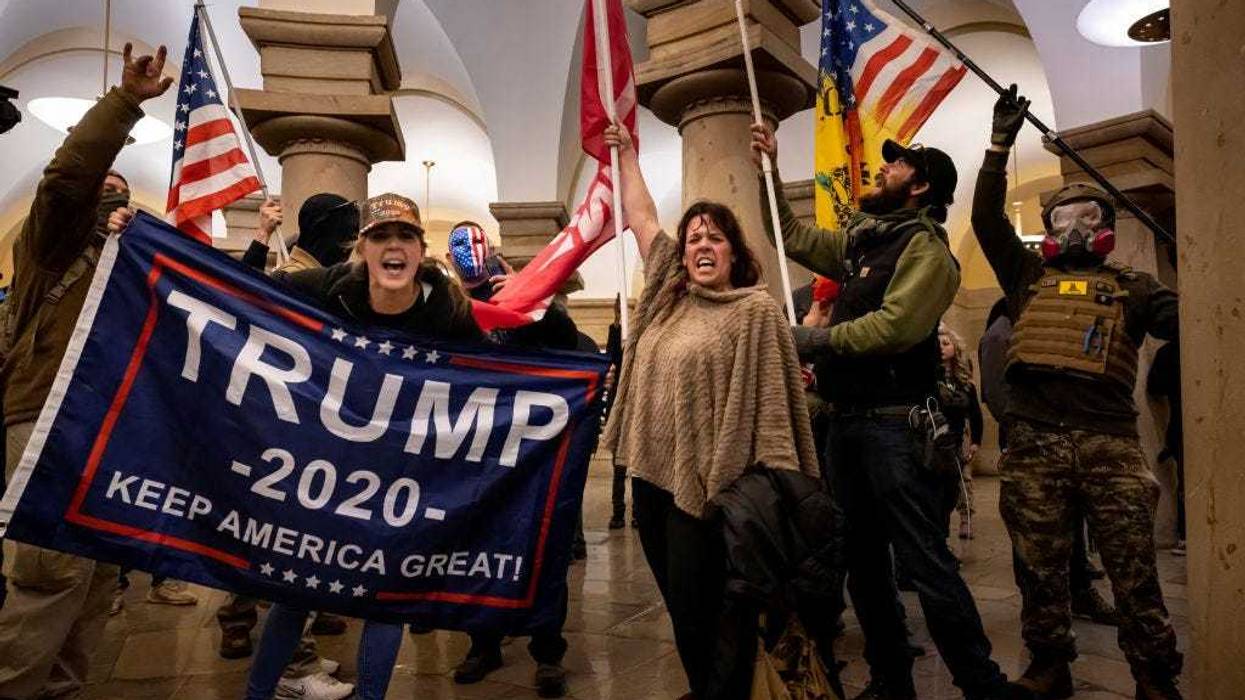 Supporters of US President Donald Trump protest inside the US Capitol on January 6, 2021, in Washington, DC. - Demonstrators breeched security and entered the Capitol as Congress debated the 2020 presidential election Electoral Vote Certification.