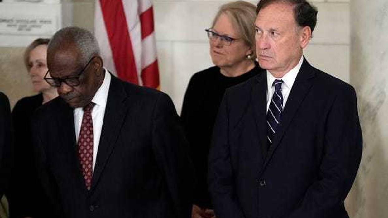 Supreme Court Justice Clarence Thomas and Justice Samuel Alito attend a private ceremony for retired Supreme Court Justice Sandra Day O'Connor before public repose in the Great Hall at the Supreme Court on December 18, 2023 in Washington, DC.