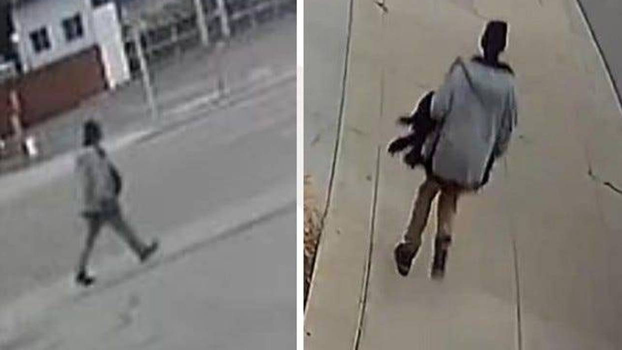 Surveillance footage of man in Grey jacket and light brown pants walking
