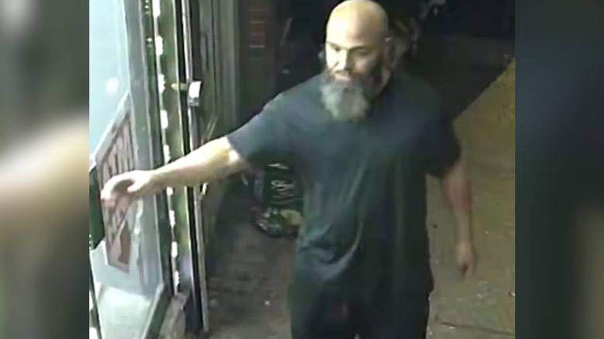 Surveillance image of a suspect in a South Philadelphia deli robbery in late April