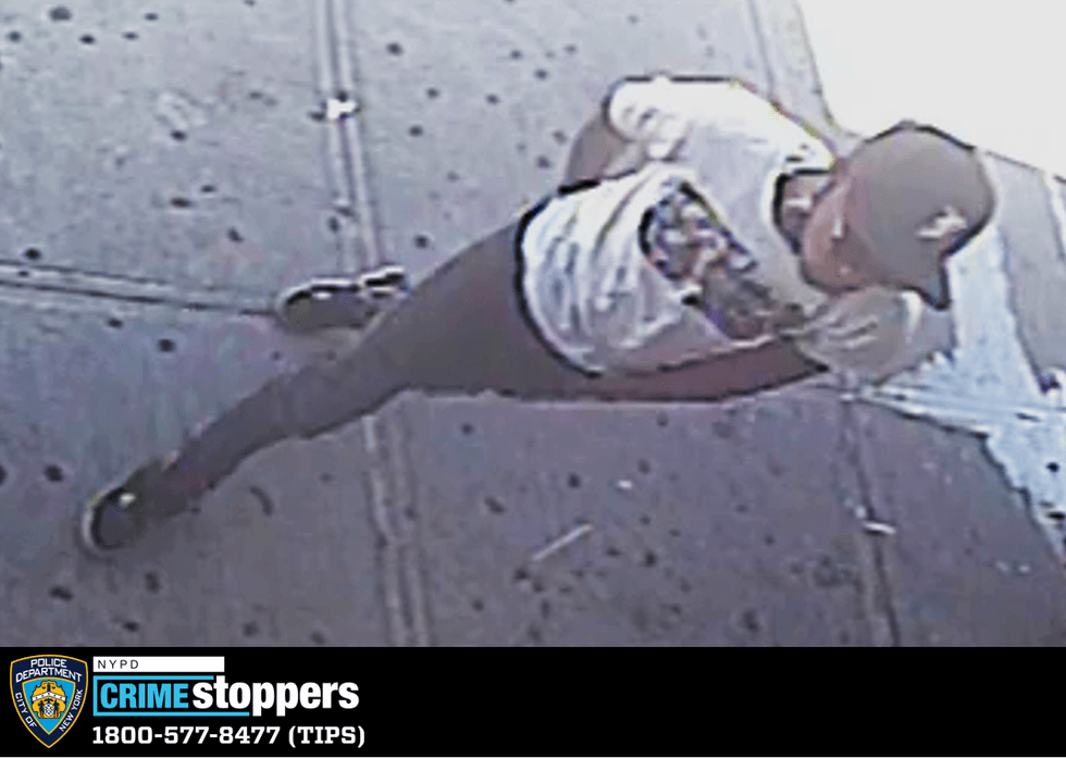 Surveillance image of man who opened jewelry store door for three other thieves
