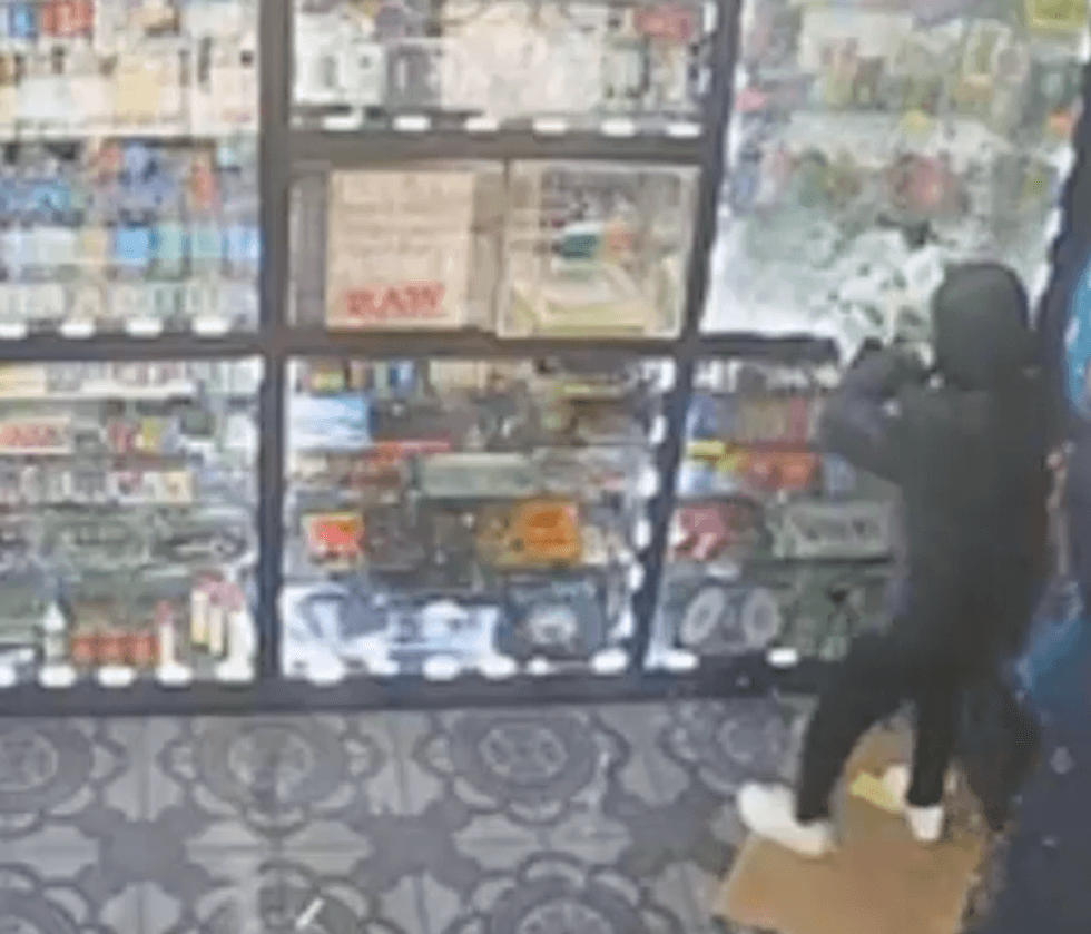 Surveillance image of robbery in process