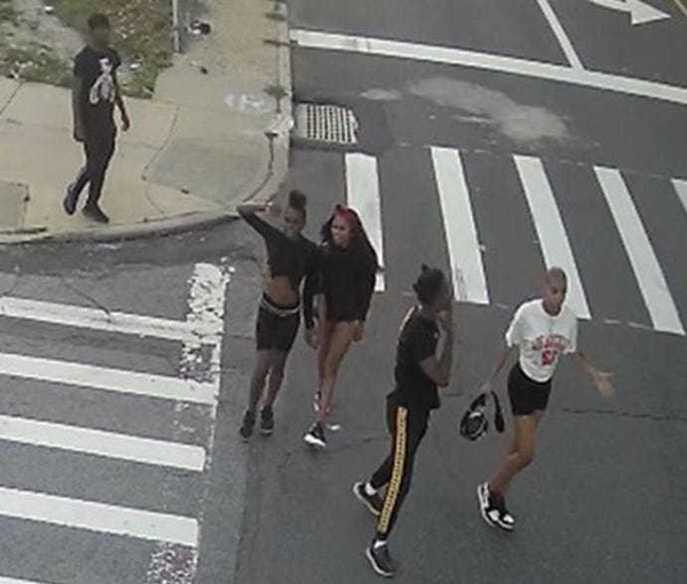 Surveillance images show the group near the scene of Saturday