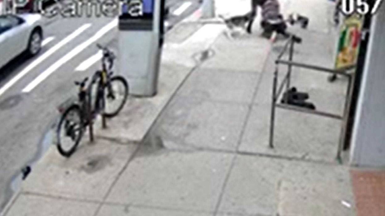 Surveillance video shows the fight on a Woodside street Wednesday afternoon