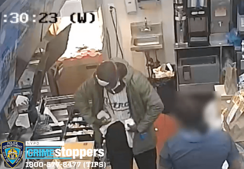 Surveillance video shows the man stuffing chicken nuggets and hamburgers into his pockets