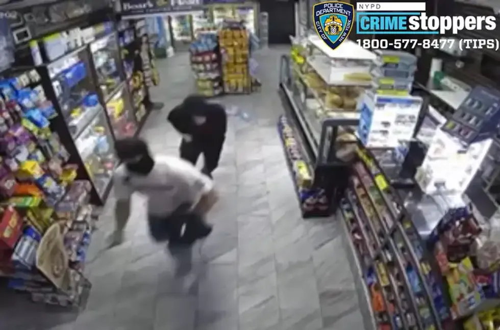 Surveillance video shows the two robbers fleeing the deli after the shooting.