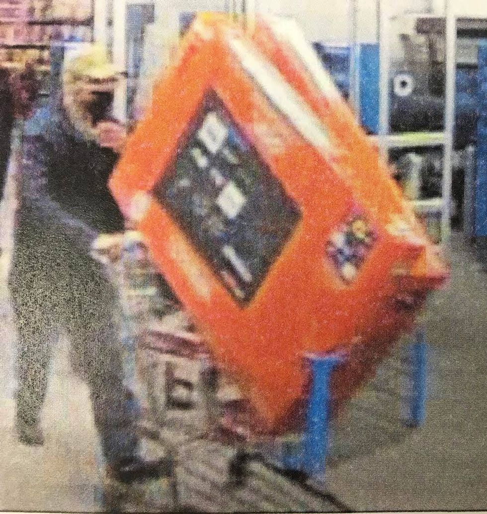 Suspect Attempting to Steal Two TV