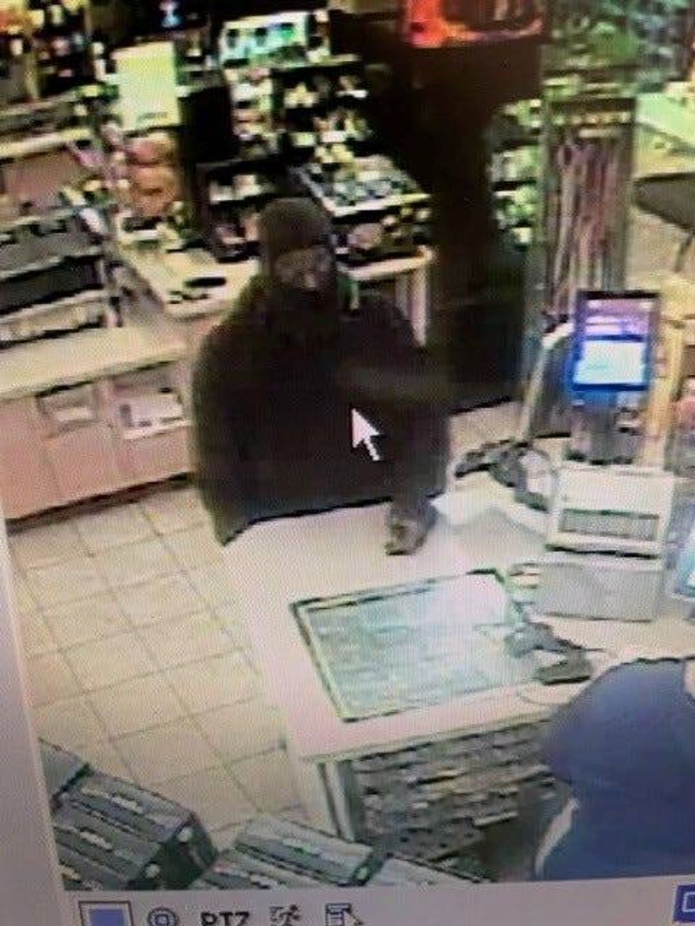 Suspect in Ann Arbor gas station robbery.