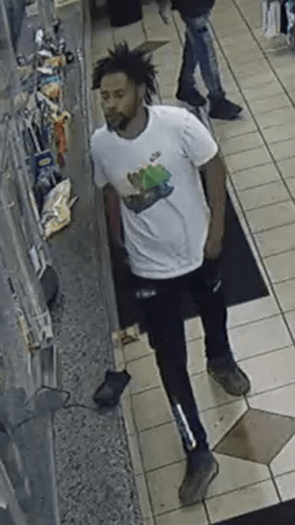 suspect in liquor store robbery