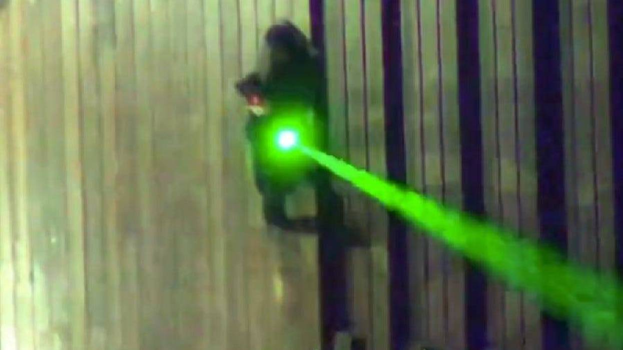 Suspect in top hat arrested for shining laser pointer at Michigan State Police helicopter