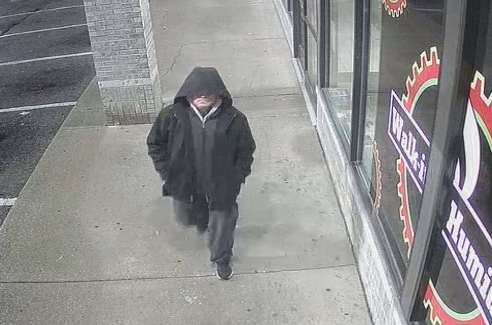 Suspect outside of Ferndale business