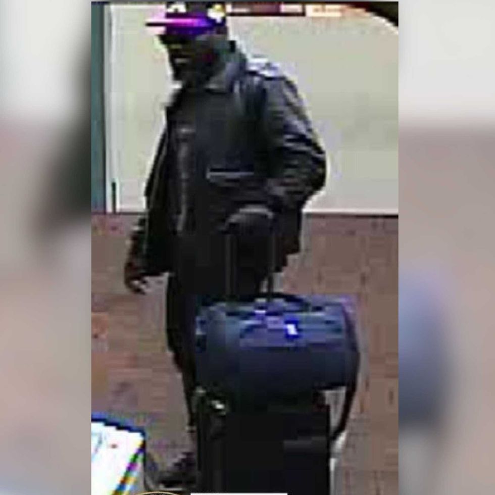 Suspect sought after man, 55, has head bashed in and robbed at a Queens subway station.