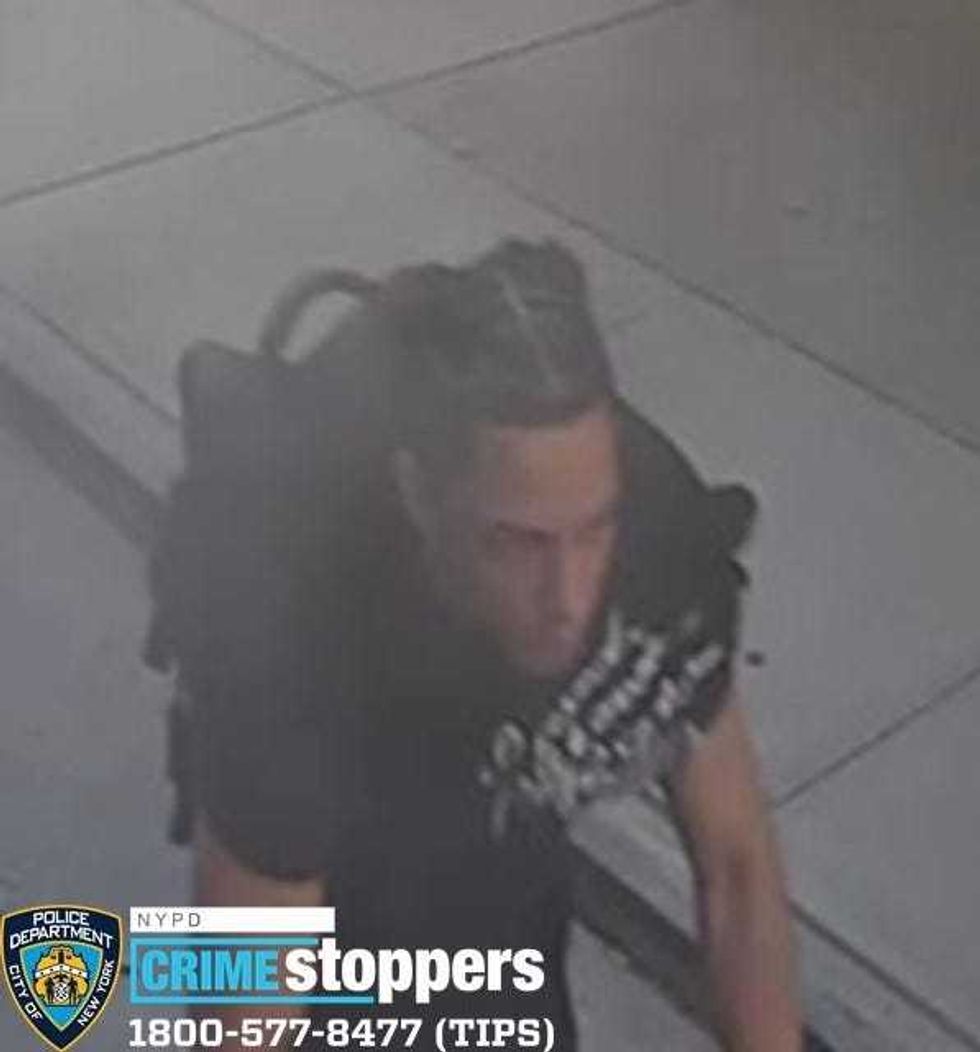 Suspect sought after woman carjacked in Washington Heights