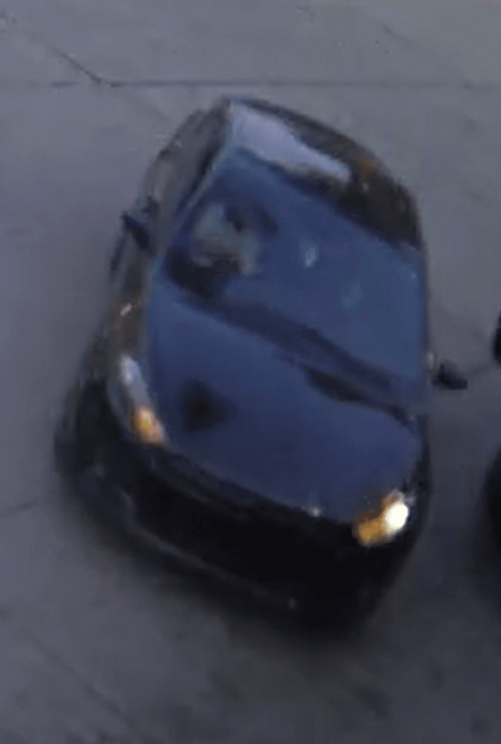 Suspect vehicle - a dark sedan