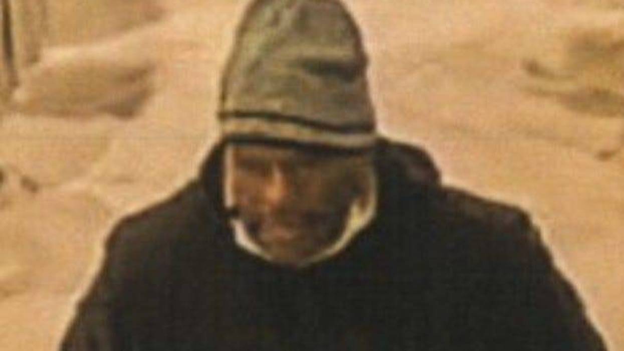 Suspect wanted for breaking into a business.