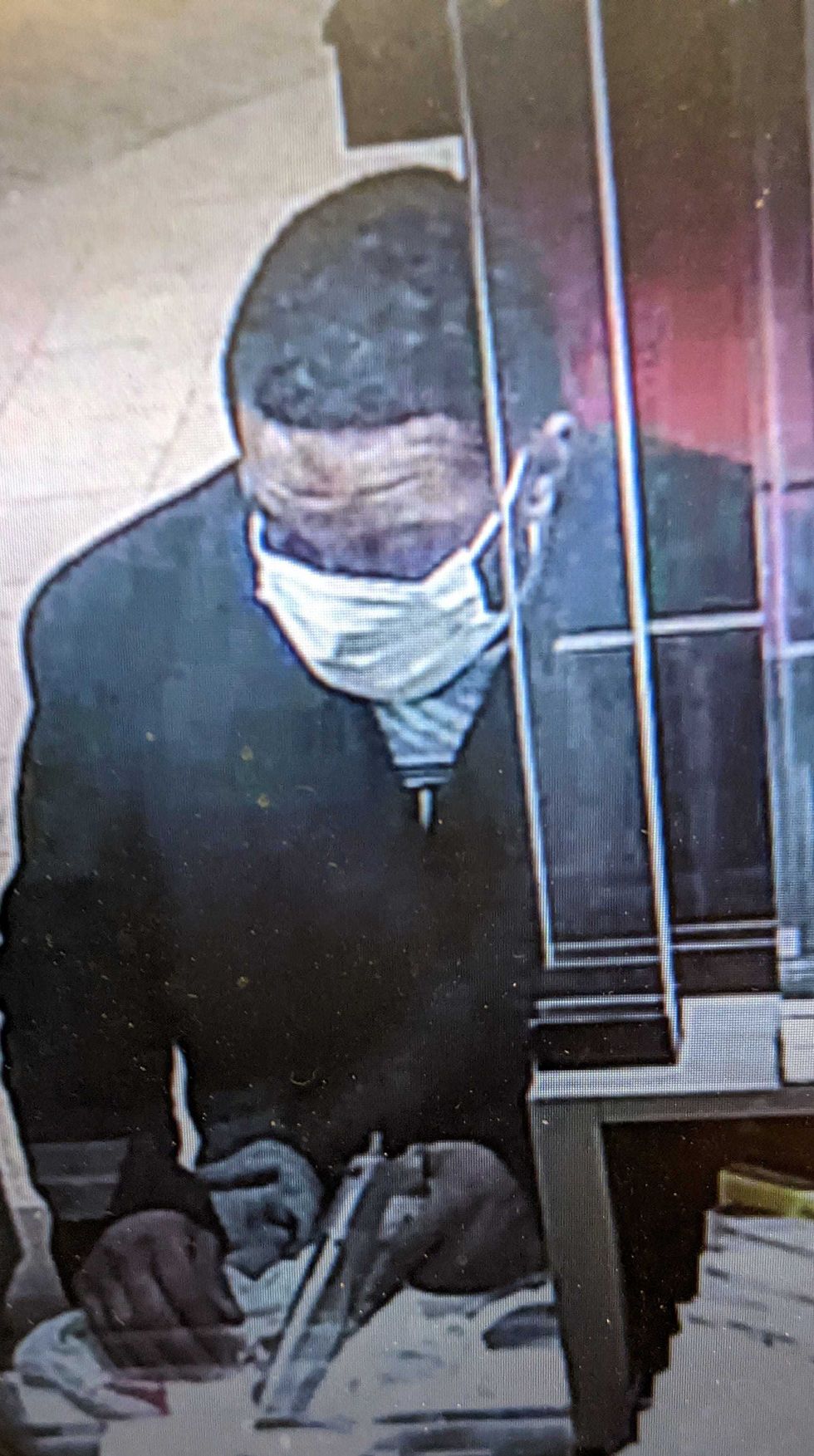 suspect with gun