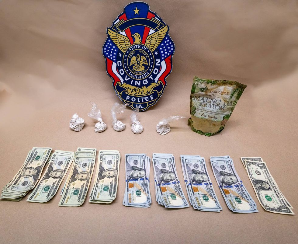 Suspected drug dealer found hiding in ditch