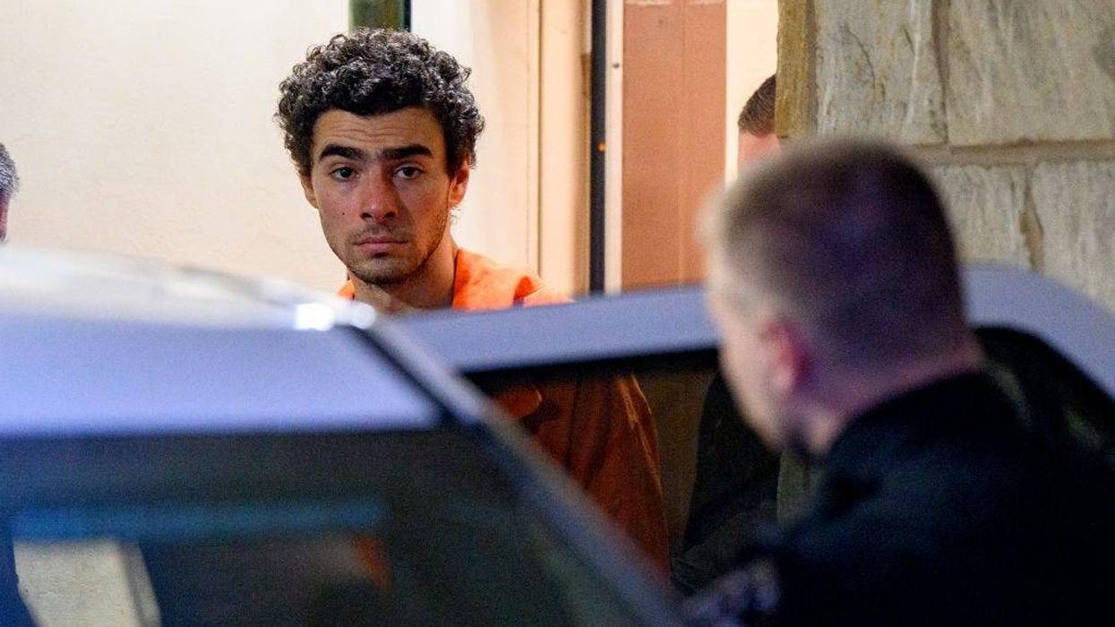 Suspected shooter Luigi Mangione is led from the Blair County Courthouse after an extradition hearing Dec. 10, 2024, in Hollidaysburg, Pennsylvania.