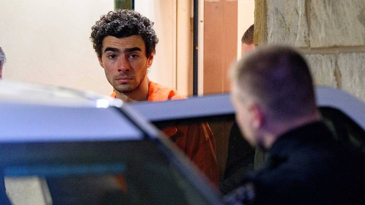 Suspected shooter Luigi Mangione is led from the Blair County Courthouse after an extradition hearing December 10, 2024 in Hollidaysburg, Pennsylvania