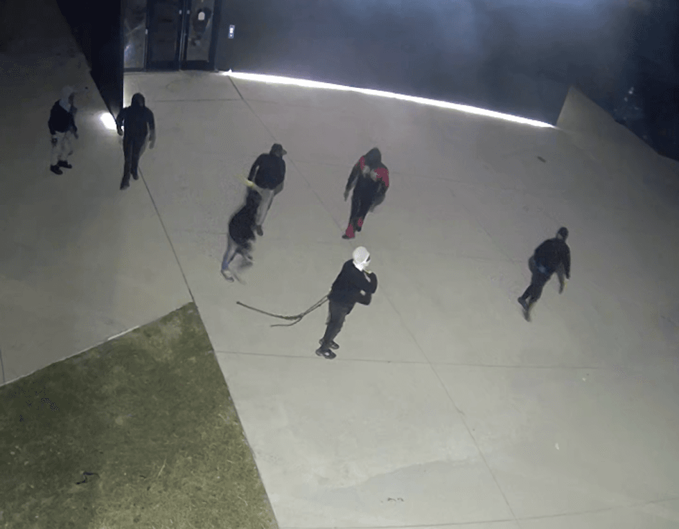 suspects in break-in in wide view