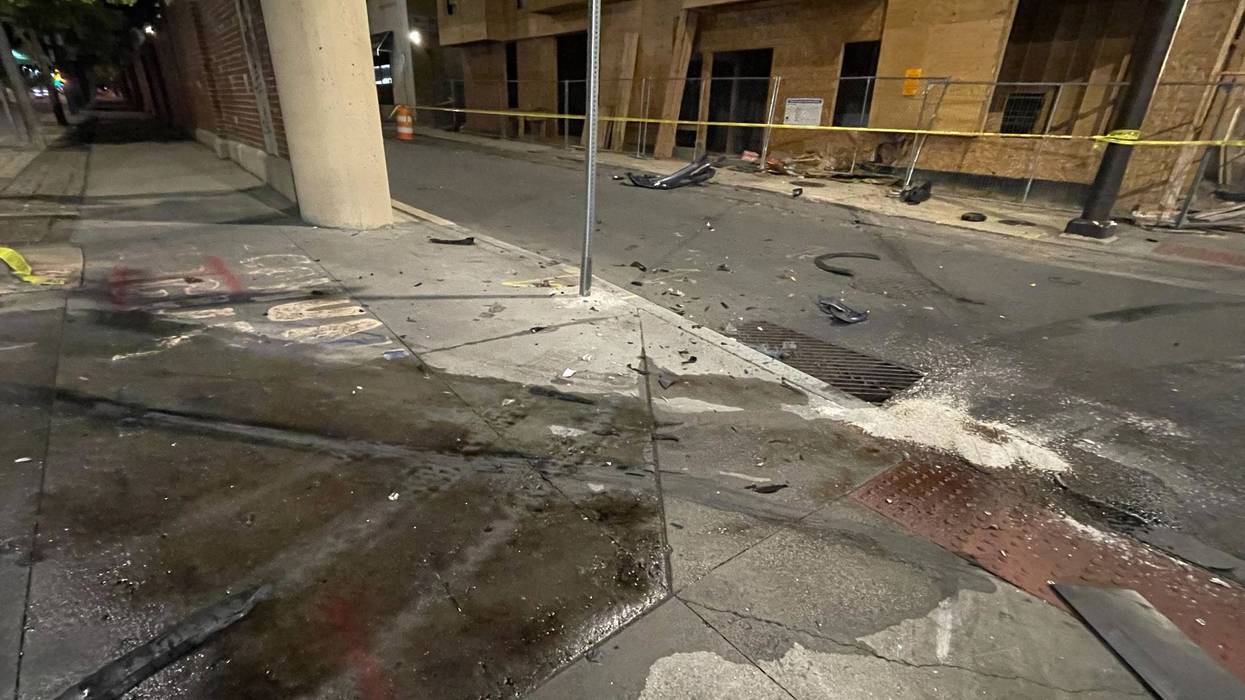 Suspects wanted after crashing stolen car into ambulance in Chinatown, police say